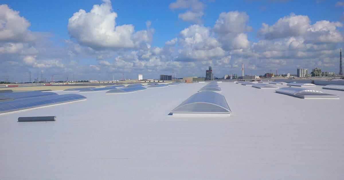 How cool roofs contribute to lower building energy costs